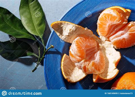 Fresh Mandarin Oranges Fruit Or Tangerines With Leaves On The Table