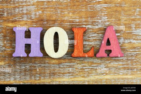 Hola Hello In Spanish Written With Colorful Wooden Letters Stock