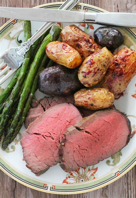 Slice the beef and remove the twine as you slice off the pieces. Slow Roasted Beef Tenderloin - with red wine pan sauce ...