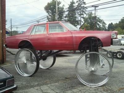 Pictures Of The Most Craziest Donk Cars And High Risers