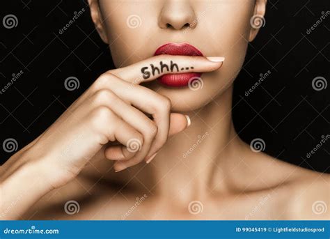 Cropped View Of Seductive Woman With Red Lips Showing Shh Symbol Stock