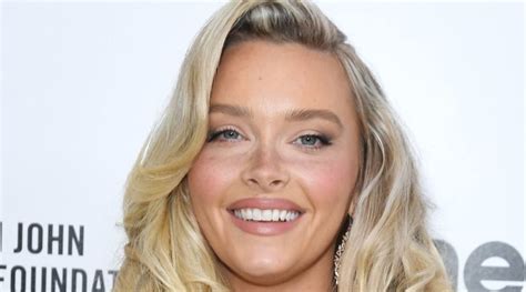 This Is What Si Swimsuit Model Camille Kostek Uses For The Perfect