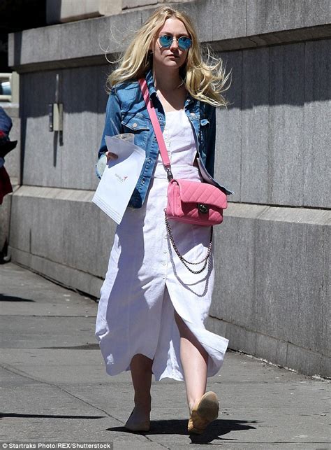 Dakota Fanning Looks Effortlessly Chic As She Runs Errands In White