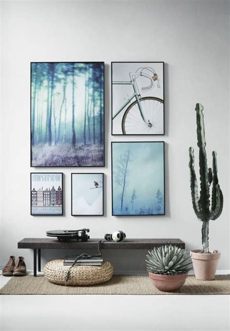 Put all your pictures and prints in matching frames and suddenly they'll look clean and modern. 10 Tips To Master Your Modern Photo Wall
