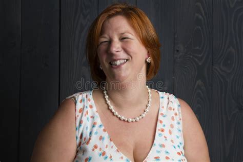 laughing red head woman stock image image of breast 95557507