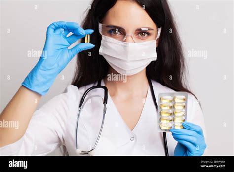 Medicine Concept Female Doctor Holding Pills Prescribed For Patient