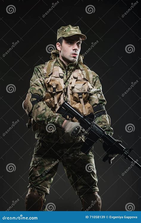 Soldier Man Hold Machine Gun On A Dark Background Stock Image Image