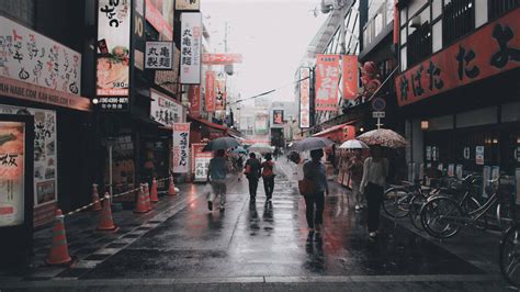 Download Rainy City Street In Japan Wallpaper