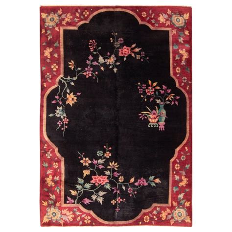 After that, the articles were coated with linseed oil (nowadays, synthetic oil) and hardened in a kiln at high temperatures. Chinese Red and Black Wool Rug with Art Deco Floral ...