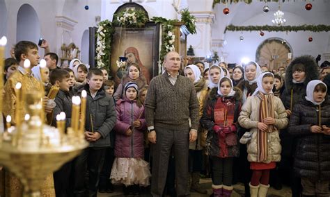Putin And Poroshenko Join Orthodox Christmas Celebrations In Pictures