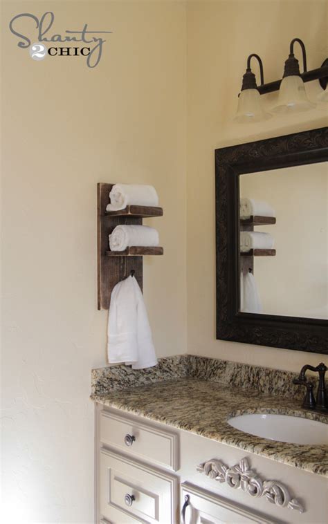 You can hang towel, loofah, sponge, bathrobe on the suction shower hooks ; Super Cute DIY Towel Holder! - Shanty 2 Chic
