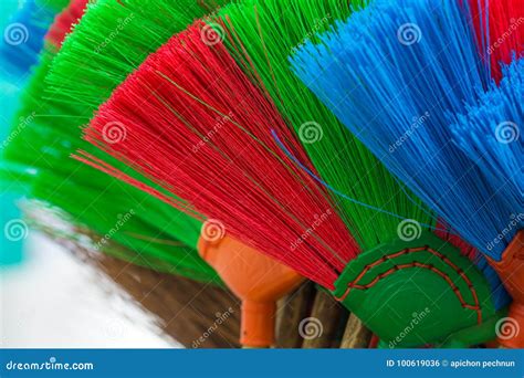 The Colorful And Patterns Of Plastic Brooms Stock Photo Image Of