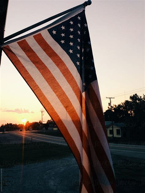 American Flag In The Sunset Del Colaborador De Stocksy Michelle