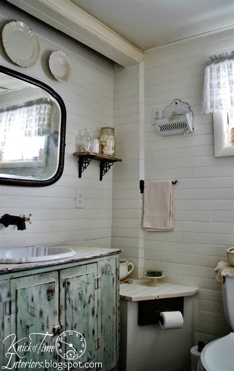 I never understood the need for these doors, they were so strange and blocked all the light from the bedroom, also unnecessary for privacy since the shower room is separate. Farmhouse Bathroom Makeover ... {again} | Knick of Time