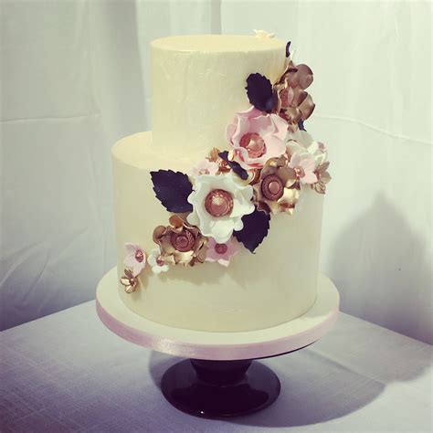 Stacking is the most architectural method of tiered cake construction. 2 Tier Buttercream Cake with Metallic Flowers - Wedding ...