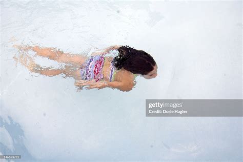 A Six Year Old Girl Swimming Underwater High Res Stock Photo Getty Images
