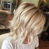 The bright, bleachy blonde color and the tousled waves give it a distinctly summery appearance that is carefree and easy to manage. 10 Top Shoulder Length Hairstyles - Wavy Hair, Women ...