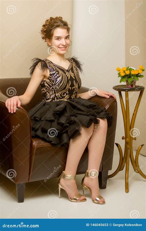 Teen Girl In Elegant Dress Sitting On The Couch Stock Image Image Of