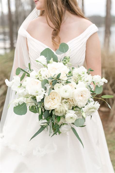 Lush Loose And Elegant Bridal Bouquet In Classic White Flowers Of