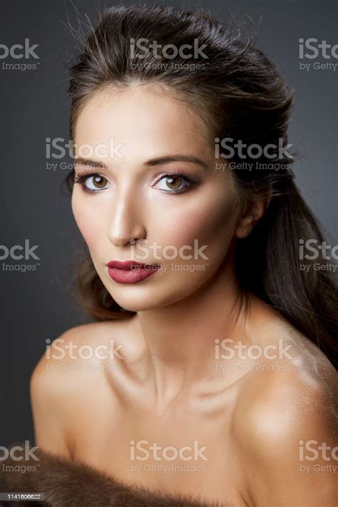 Close Up Beauty Portrait On A Gray Background Stock Photo Download