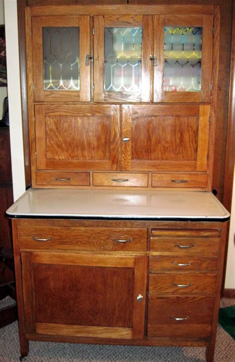Pine furniture painted white will have knots that bleed thru causing yellow round stains. Tracy's Toys (and Some Other Stuff): 1916 Hoosier Cabinet