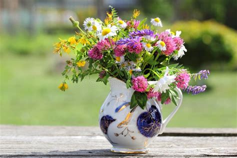 Bouquet Of Wildflowers In A Jug Stock Photo Image Of Flowers Happy