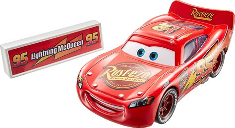 Disney Pixar Cars Movie Moments Lightning Mcqueen With Pit Stop Barrier Amazon Ca Toys And Games