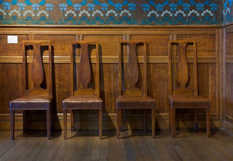 Four Dining Chairs By Mackay Hugh Baillie Scott
