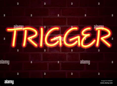 Trigger Neon Sign On Brick Wall Background Fluorescent Neon Tube Sign On Brickwork Business