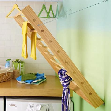 See more ideas about diy clothes dryer, clothes drying racks, clothes dryer. Diy Indoor Clothesline Storage ... | Diy clothes drying rack, Storage solutions diy, Laundry ...