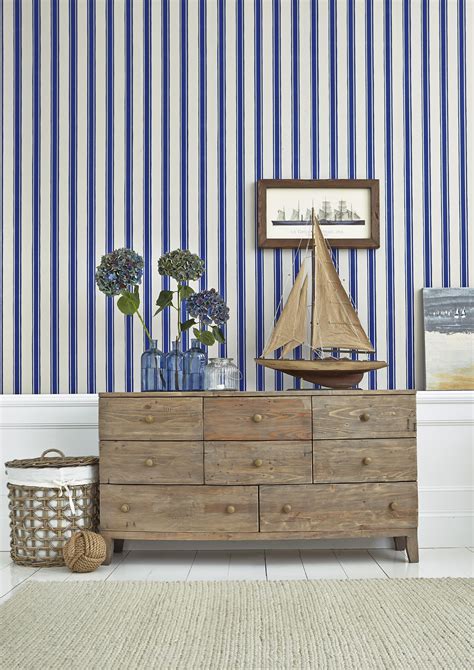 Blue Striped Wallpaper And Rustic Wooden Sideboard Nautical Decor In