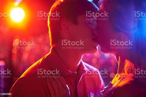 Tender Kiss Stock Photo Download Image Now Kissing Nightclub