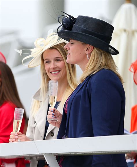 Racegoers Turn Epsom Into A Riot Of Colour On Ladies Day Daily Mail