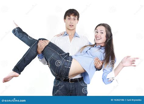 Couple In Love Man Carrying Woman In His Arms Stock Photography