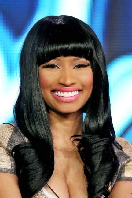 Nicki Keeps This Look Demure By Minaj Standards By Pairing Glossy Locks With A Bright Pink Lip