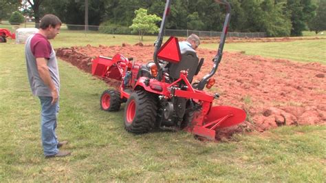 How To Plow With A Subcompactkubota Bx Tractor Youtube