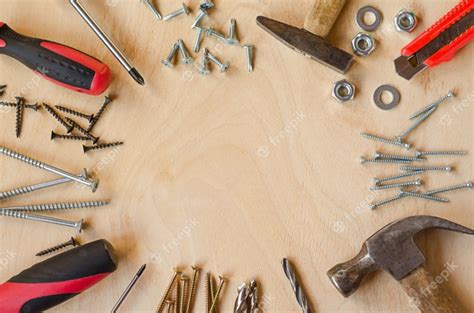 Premium Photo Set Of Tools For Carpenter On Wooden Background