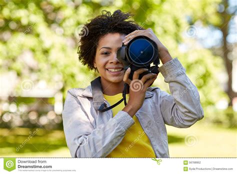 Happy African Woman With Digital Camera In Park Stock Photo Image Of