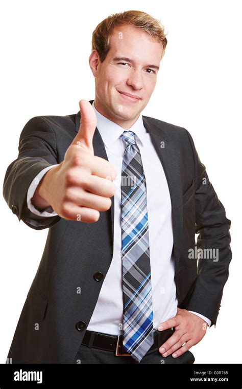 Smiling Happy Business Man Holding His Thumbs Up Stock Photo Alamy
