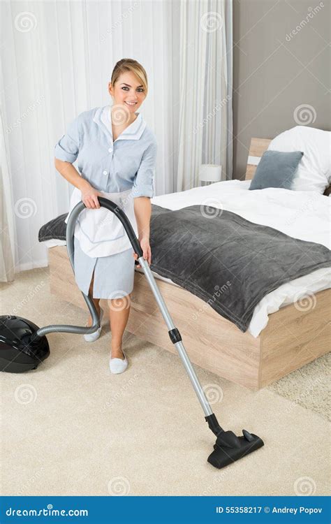 Housekeeper Cleaning With Vacuum Cleaner Stock Photo Image 55358217