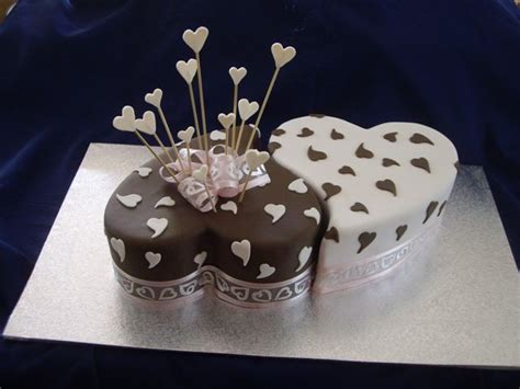 Due to the number of postponed wedding cake bookings from 2020 & 2021 we will be unable to accept celebration cake bookings from 15thmay 2021 for the foreseeable future. 2 Hearts Shaped Ying-Yang Designer Engagement Ring Roka ...