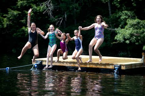 Do You Have Fun With Friends Swimming In A Lake At Your Soccer Camp We