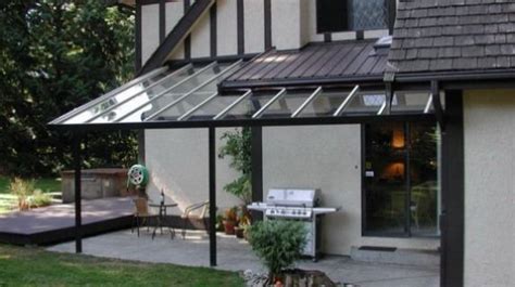 Retractable awnings are a stylish primrose patio awnings. Glass patio with retractable shades. | Patio shade, Patio ...