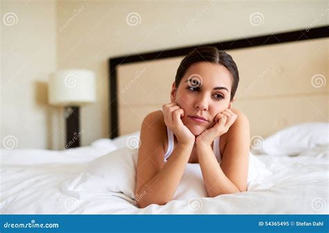 Woman Lying Down Resting Chin In Hands Stock Image Image Of Aloof