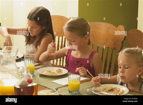 Children Enjoying Their Pancake Breakfast Stock Photo Alamy