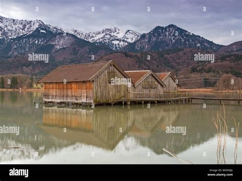 Boathouses At Lake Kochelsee Bavaria Germany On A Winter Evening