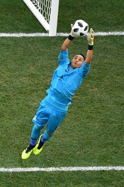 Costa Ricas Goalkeeper Keylor Navas Jumps For The Ball During The