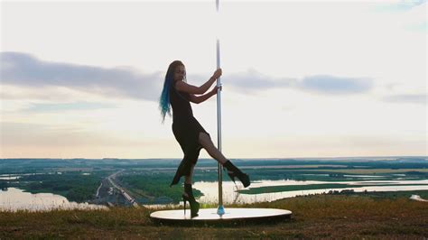 pole dance on nature woman with long blue stock footage sbv 338618119 storyblocks