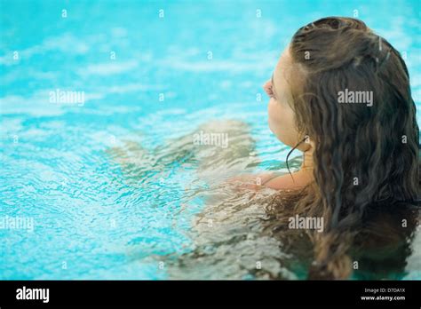Woman Back Sitting Pool Tan Hi Res Stock Photography And Images Alamy