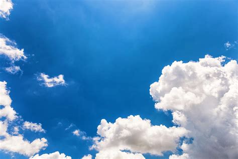 Cloudscape Against Deep Blue Sky By Apomares